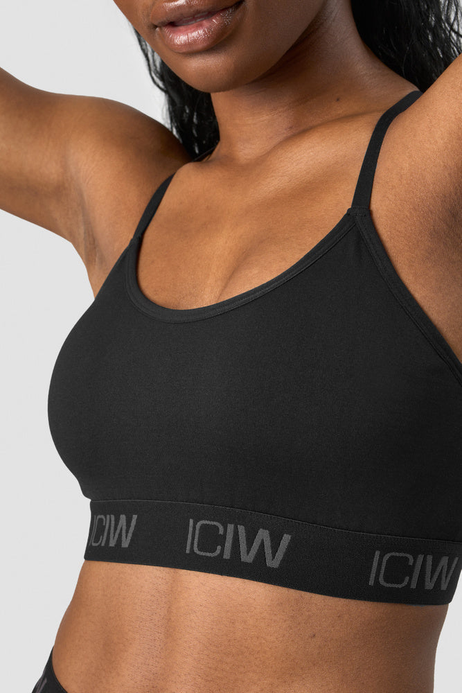 define seamless logo strappy sports bra black