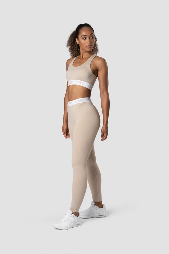 define seamless logo tights wmn sand/white