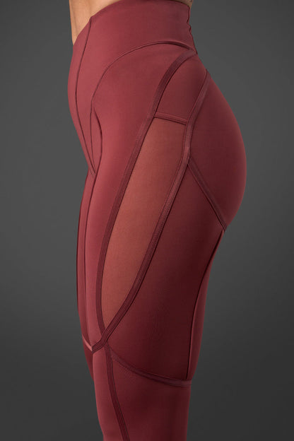 reboot tights brick red